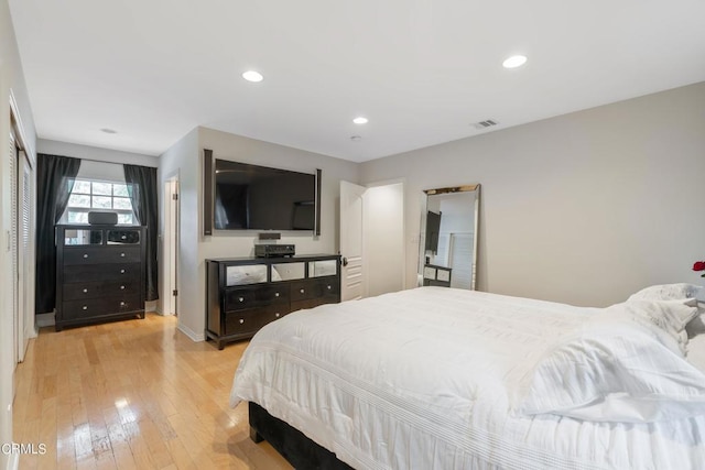 bedroom with light hardwood / wood-style flooring