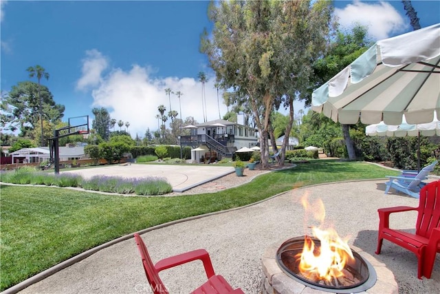 view of patio featuring a fire pit