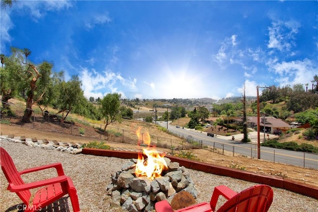 view of yard featuring a fire pit