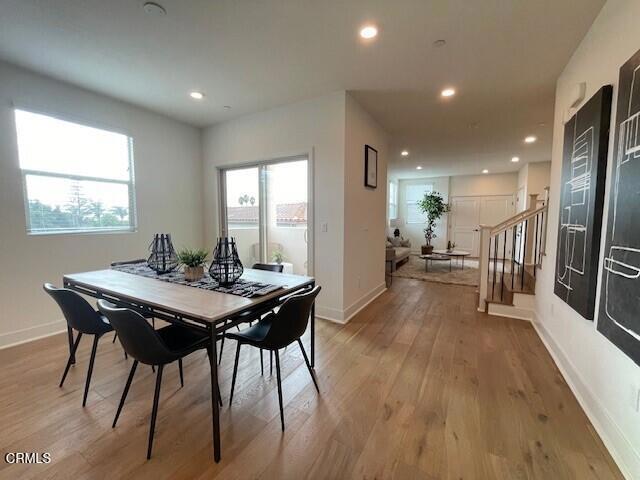 dining area featuring light wood-type flooring