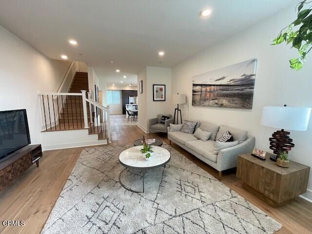 living room featuring wood-type flooring