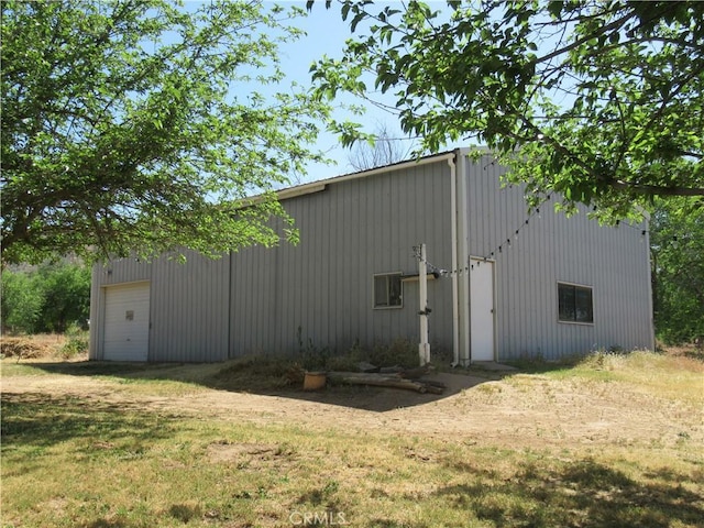 view of outdoor structure with a garage