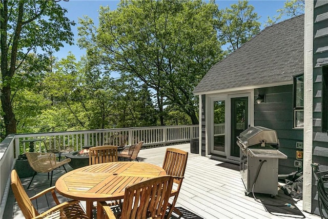 wooden deck with grilling area