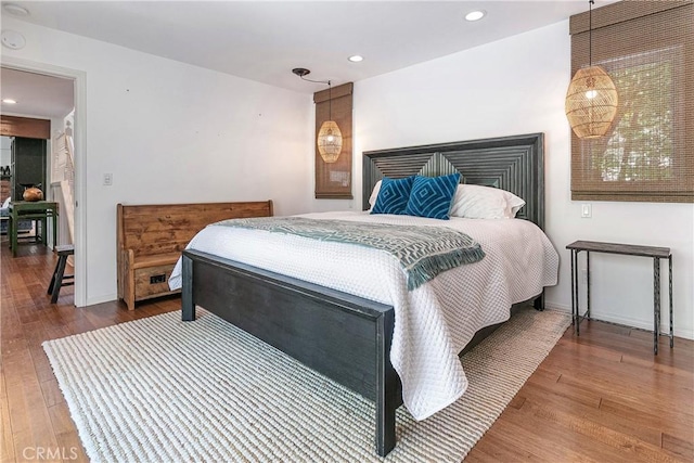 bedroom featuring hardwood / wood-style flooring