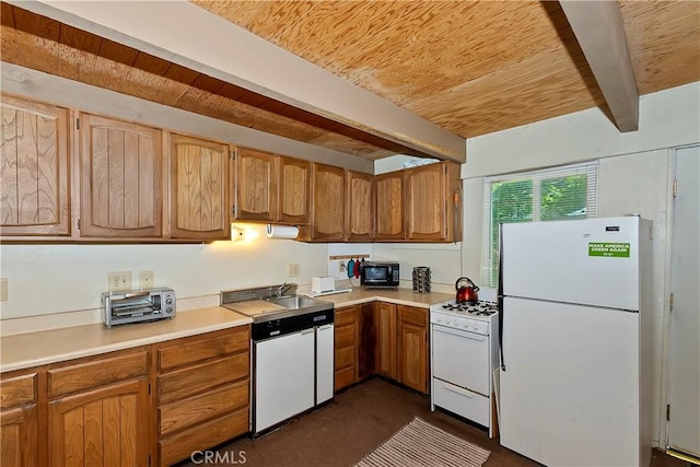 kitchen with beamed ceiling, wood ceiling, and white appliances