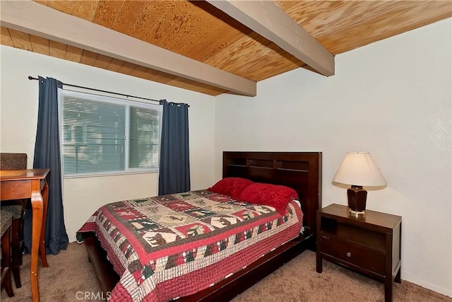 bedroom featuring light colored carpet, wood ceiling, and beam ceiling