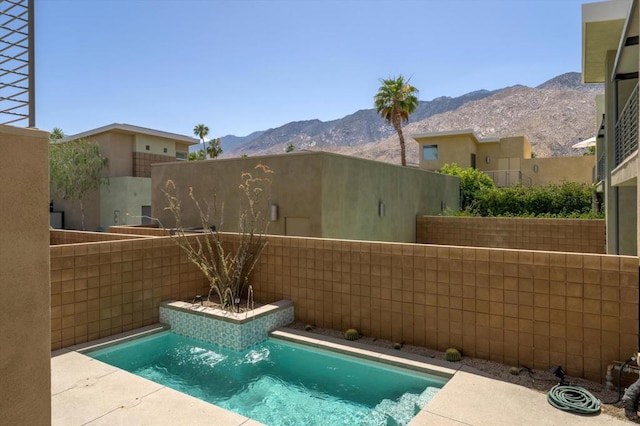 view of pool featuring a mountain view