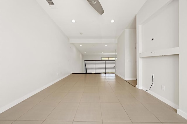 empty room featuring light tile patterned floors