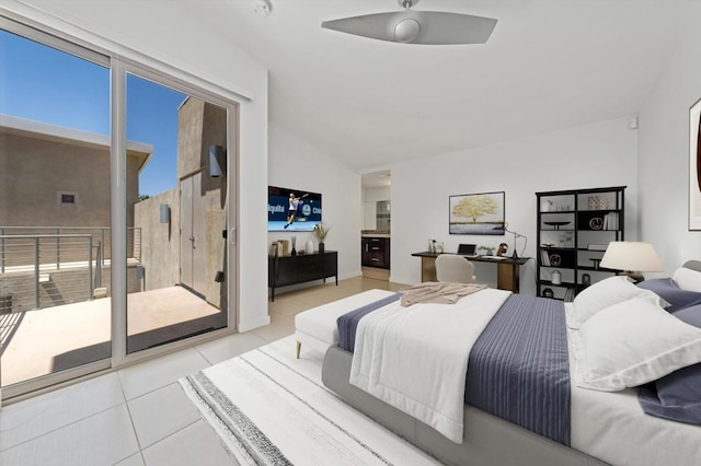 bedroom with light tile patterned floors, vaulted ceiling, and access to outside