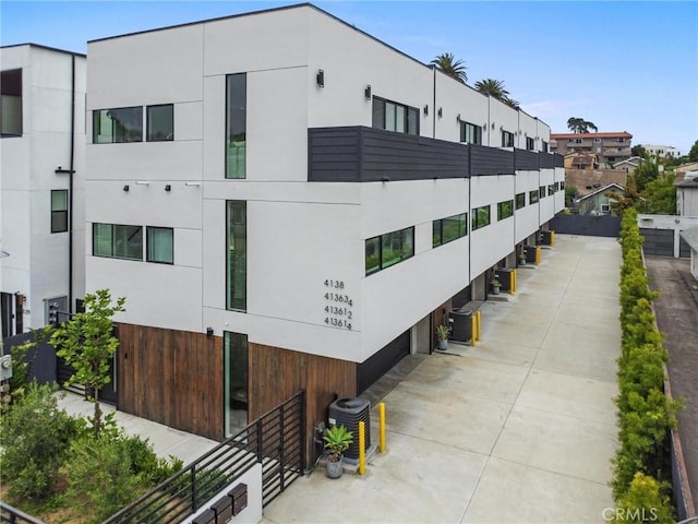 view of property with central AC unit