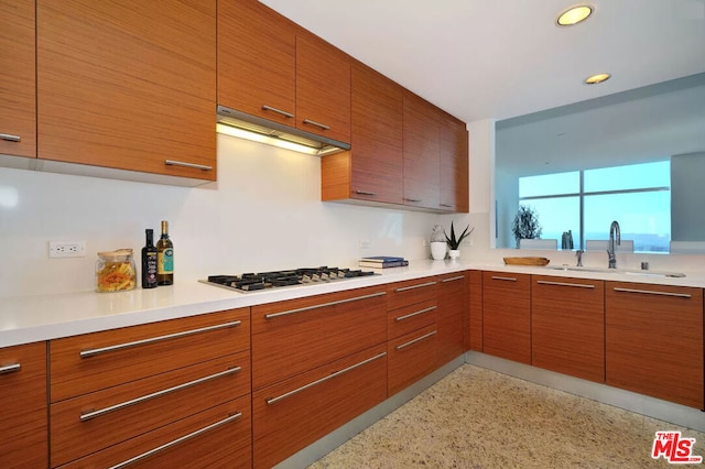 kitchen featuring gas cooktop and sink