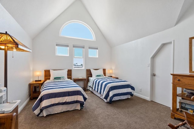 bedroom featuring high vaulted ceiling and carpet flooring