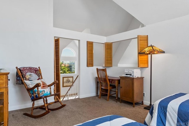 bedroom featuring high vaulted ceiling and carpet