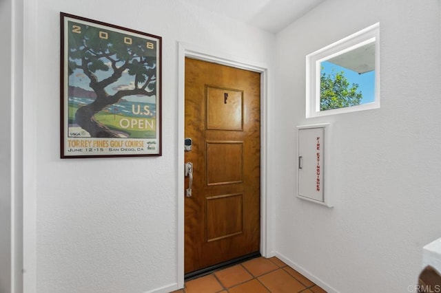 view of tiled foyer entrance