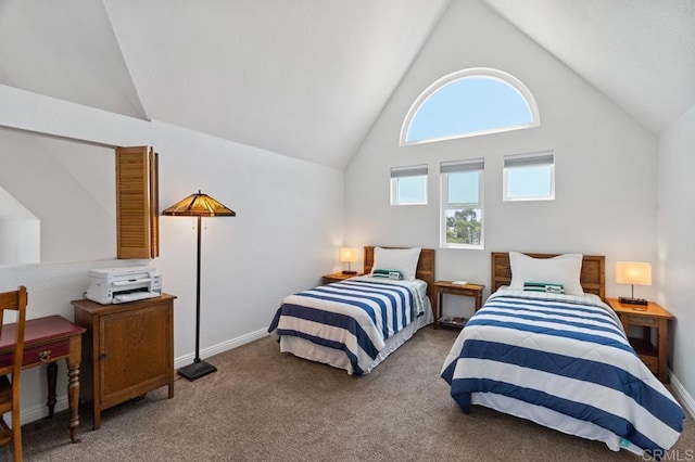 bedroom featuring high vaulted ceiling and carpet floors