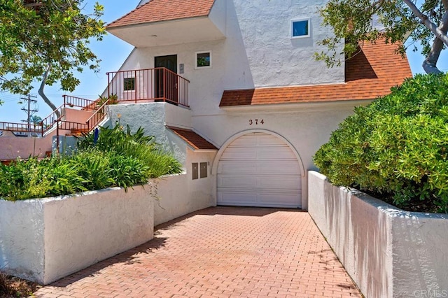 view of front of home featuring a garage