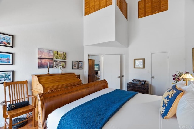 bedroom with a towering ceiling