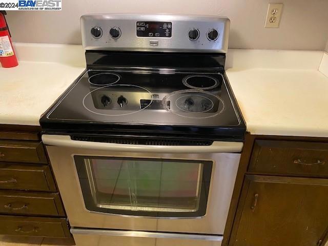 details with stainless steel range with electric stovetop