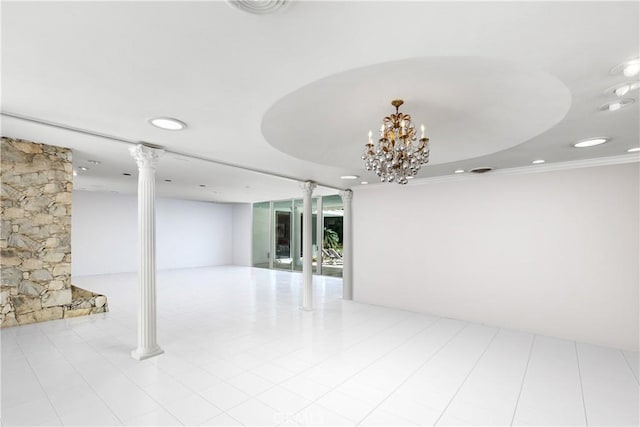 spare room with recessed lighting, decorative columns, and crown molding