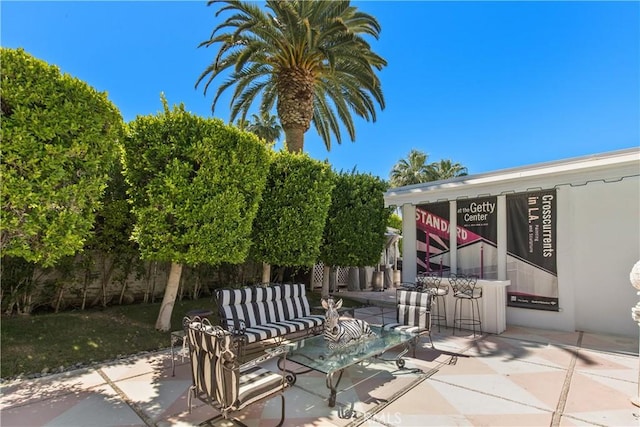 view of patio featuring fence