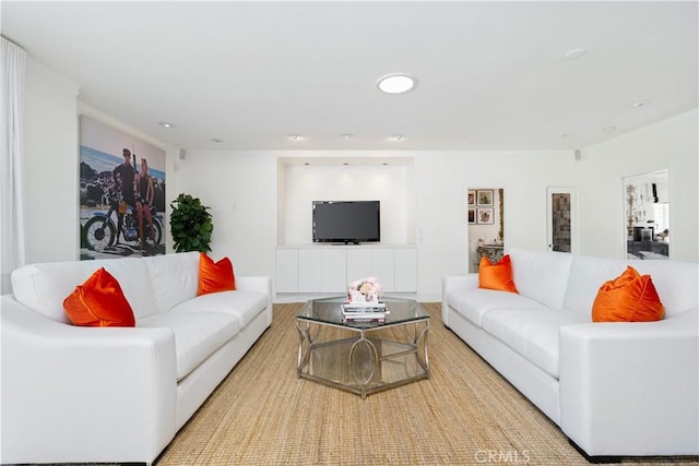 living room with recessed lighting