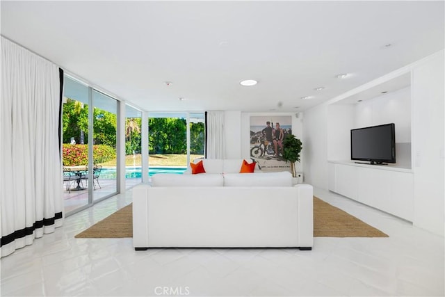 unfurnished living room with floor to ceiling windows