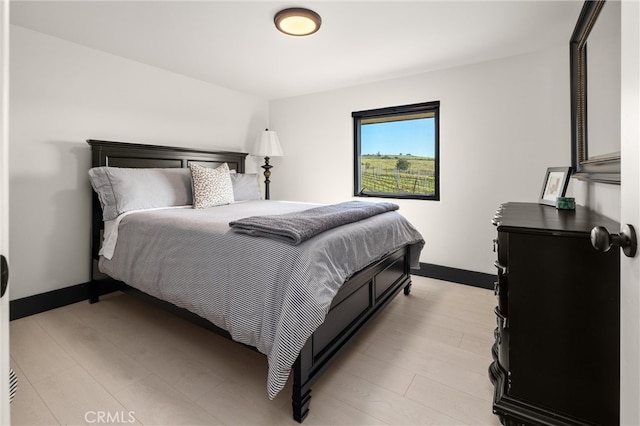 bedroom featuring light hardwood / wood-style flooring