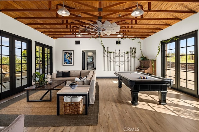 rec room featuring french doors, pool table, hardwood / wood-style flooring, and wood ceiling