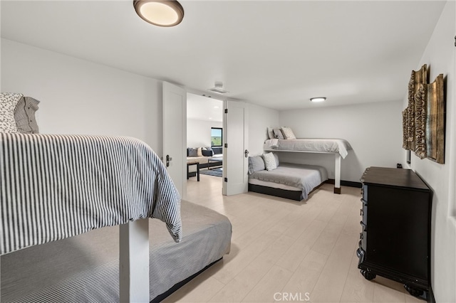 bedroom featuring light wood-type flooring