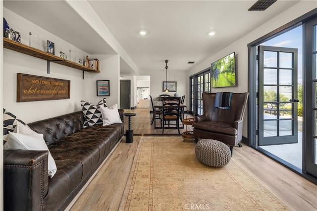 living room with hardwood / wood-style floors