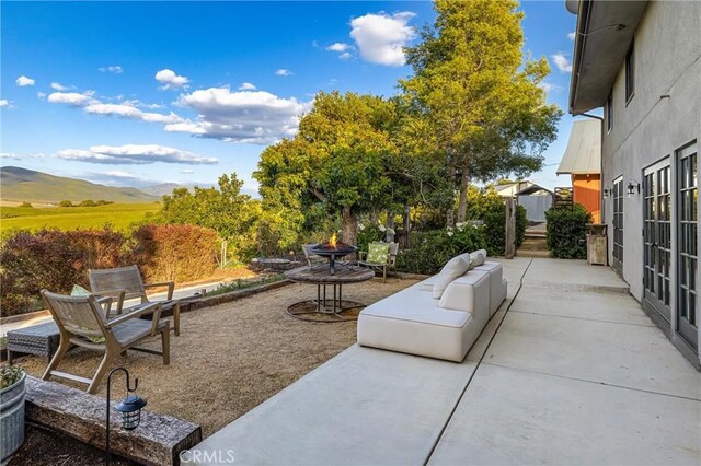 view of terrace featuring a mountain view