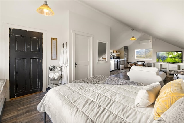 bedroom with a wall unit AC, vaulted ceiling, and dark hardwood / wood-style flooring