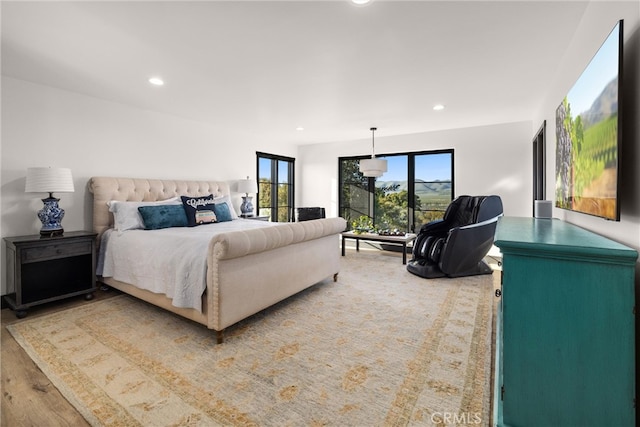 bedroom featuring wood-type flooring