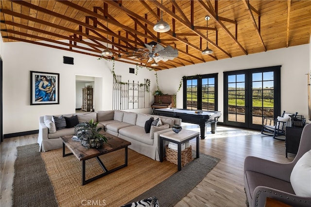 living room with high vaulted ceiling, french doors, hardwood / wood-style flooring, and wood ceiling