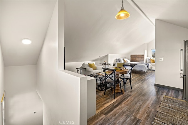 interior space with dark hardwood / wood-style floors and vaulted ceiling