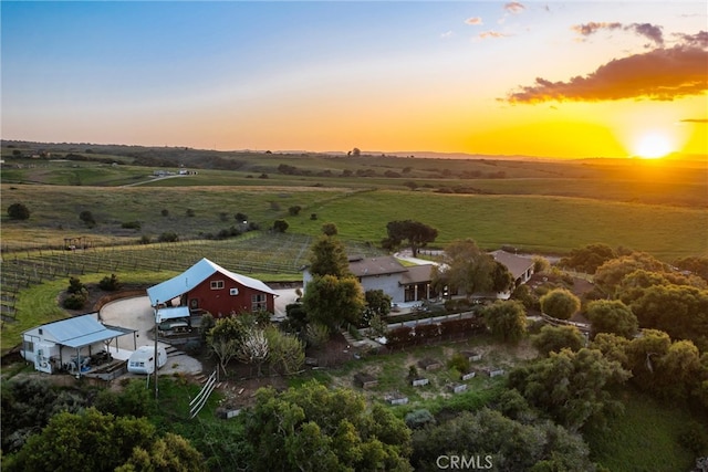 aerial view at dusk with a rural view