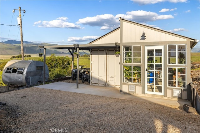 view of outdoor structure featuring a mountain view