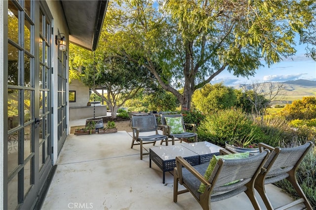 view of patio featuring a mountain view