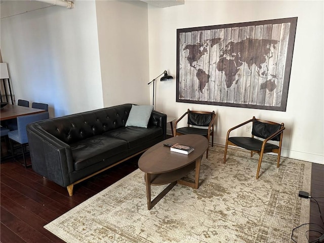 living room with dark hardwood / wood-style flooring