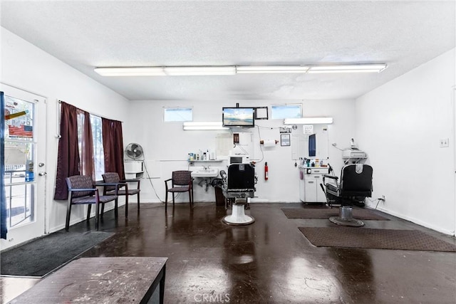 interior space featuring a textured ceiling