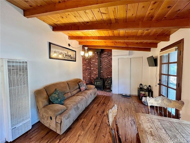 living room with a wood stove, wooden ceiling, beamed ceiling, a wall mounted AC, and wood-type flooring