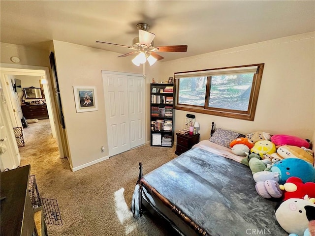 bedroom featuring ceiling fan, carpet floors, and a closet