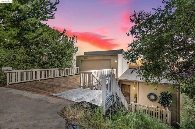 view of front of house with a wooden deck