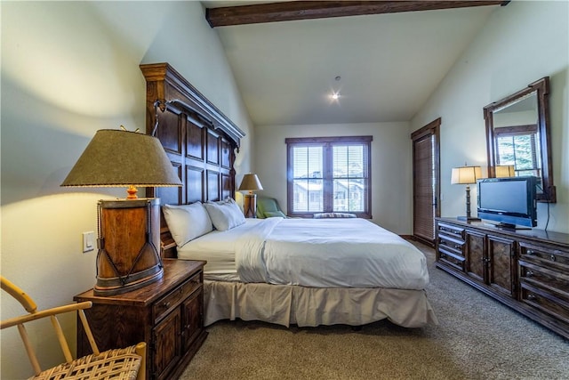 carpeted bedroom featuring lofted ceiling with beams