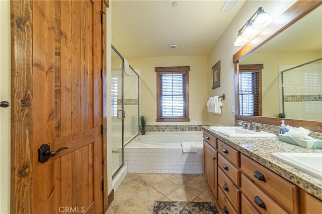 bathroom with separate shower and tub, tile patterned flooring, and vanity