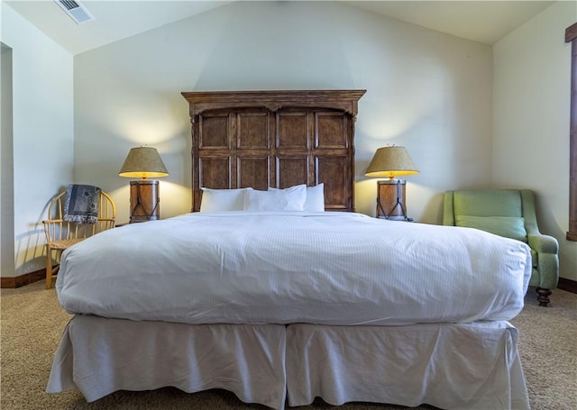 bedroom featuring carpet flooring and lofted ceiling