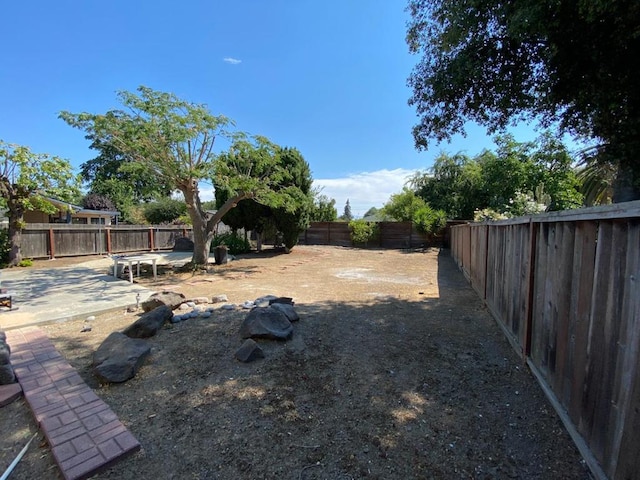 view of yard with a patio area