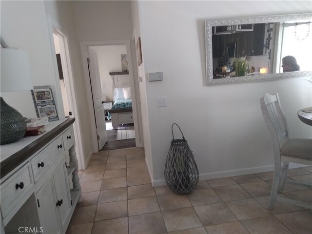 interior space featuring light tile patterned floors