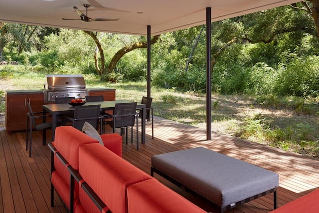 deck with an outdoor living space, grilling area, and ceiling fan