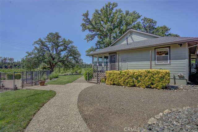 view of property exterior featuring a yard